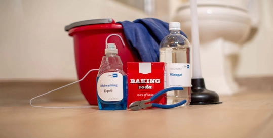 Various Items placed on a bathroom floor